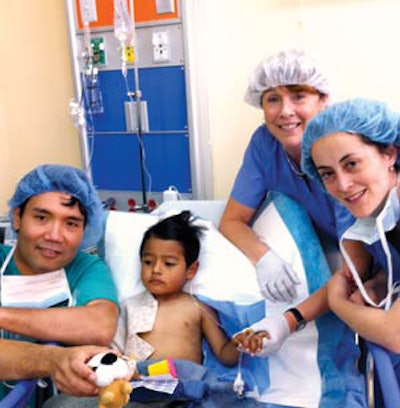 ENT and PACU team with post-op adenoidectomy patient: Howard Boey, MD (left)., Shauna Bartlett, Karina Canadas, MD (right).