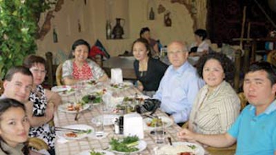 Restaurant dinner with hosts and translators. Hosts Drs. Guhar and Lazzat, are at the end of the table. Chris Jenkins, MD, Tulsa, OK, (right), Eric Schackow MD, Chicago, IL (left), and physician-translator (left foreground).