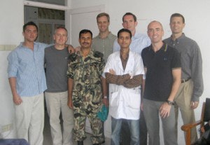 Operation Sight, Sound, and Smile team (front l. to r.) Scott Roofe, MD, Nepalese medical resident, member of Nepalese Army, Michael Turner, and Mitchell Stone. (back l. to r.) Scott Croll, MD, Eric Wirtz, MD, and Dave Healy, MD.