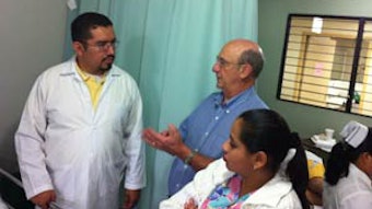 Dr. Brackmann (middle) performed 38 surgeries in four days.