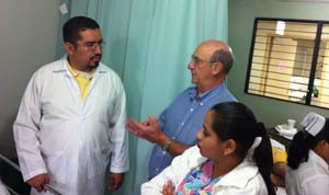 Dr. Brackmann (middle) performed 38 surgeries in four days.