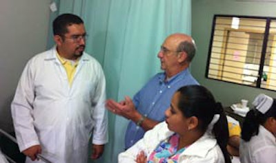 Dr. Brackmann (middle) performed 38 surgeries in four days.