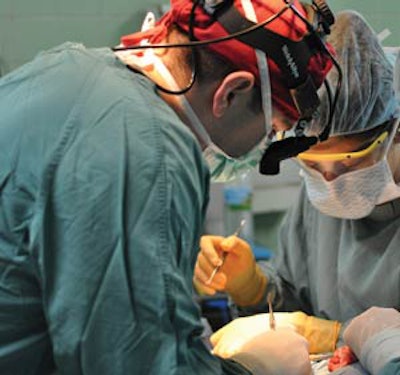 Dr. Glazer and Dr. Rodriguez-Bruno harvesting a rib graft.