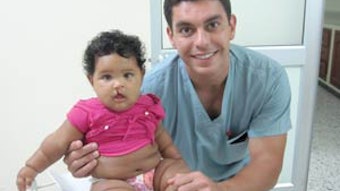 Dr. Azzi pre-operatively with his patient.