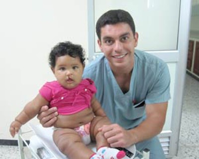 Dr. Azzi pre-operatively with his patient.