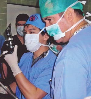 Dr. Setabutr searches for foreign body in the nasopharynx with flexible nasopharyngoscope.