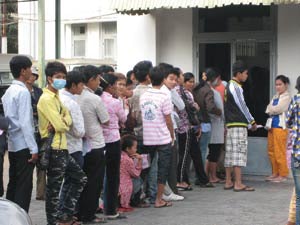 Cambodian patients lined up awaiting evaluation at our clinic