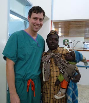 Eric Dobratz, MD, with patient and family after surgery.