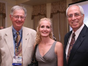 Robert Ruben, MD (left) and guest, Dara (Grundfast) Eisner, and Kennth M. Grundfast, MD (right).