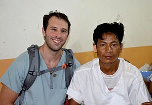 Ian Humphreys, DO, with a post-operative patient.