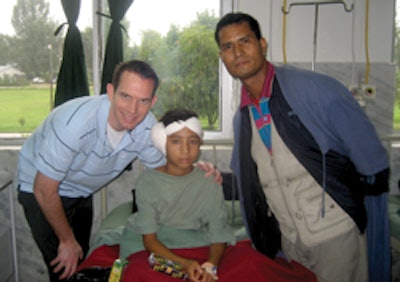 Operation Sight, Sound, and Smile team (front l. to r.) Scott Roofe, MD, Nepalese medical resident, member of Nepalese Army, Michael Turner, and Mitchell Stone. (back l. to r.) Scott Croll, MD, Eric Wirtz, MD, and Dave Healy, MD.