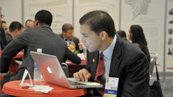 A member of the Millennium Society uses his computer in the 2011 Millennium Society Donor Appreciation Lounge. To join the Society, visit www.entnet.org/donate