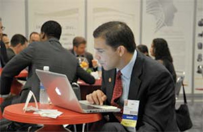 A member of the Millennium Society uses his computer in the 2011 Millennium Society Donor Appreciation Lounge. To join the Society, visit www.entnet.org/donate