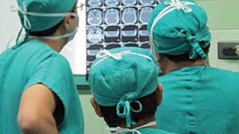 Reviewing Temporal bone CT with residents prior to surgery, Chicalyo, Peru.