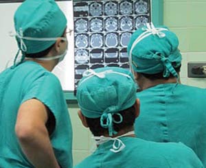 Reviewing Temporal bone CT with residents prior to surgery, Chicalyo, Peru.