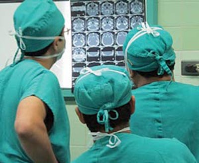 Reviewing Temporal bone CT with residents prior to surgery, Chicalyo, Peru.