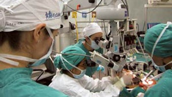 Performing microlaryngoscopy at Sabogal Hospital.