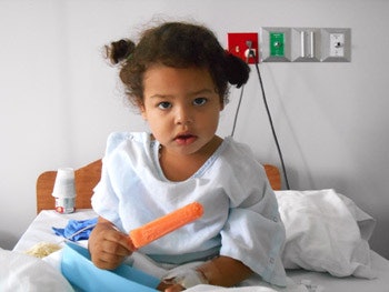 One of our pediatric patients enjoys a treat after surgery.