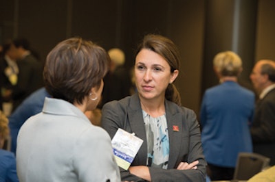 Members Lauren S. Zaretsky, MD, and Sonya Malekzadeh, MD, chat between comittee sessions.