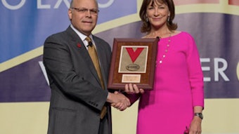Nancy L. Snyderman, MD, receives a plaque following her presentation of the John Conley, MD Lecture on Medical Ethics from James L. Netterville, MD 2012/2013 AAO-HNS/F President.