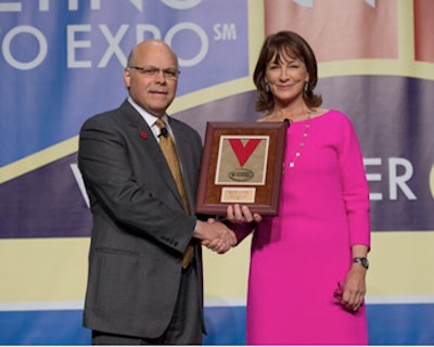Nancy L. Snyderman, MD, receives a plaque following her presentation of the John Conley, MD Lecture on Medical Ethics from James L. Netterville, MD 2012/2013 AAO-HNS/F President.