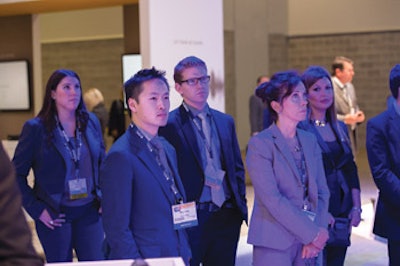 Technological advances attract a crowd of Academy members to an exhibit hall demonstration.