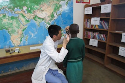 Conducting an otitis media with effusion screening study at a local elementary school.