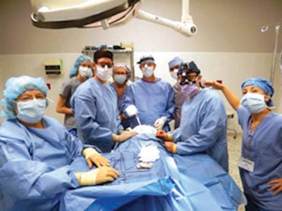 The ENT team removing a branchial cleft cyst.