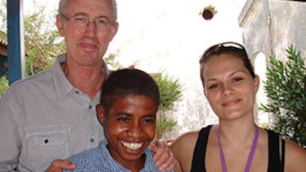Dr. Curotta, nurse, and a happy patient at Baucau, East Timor.