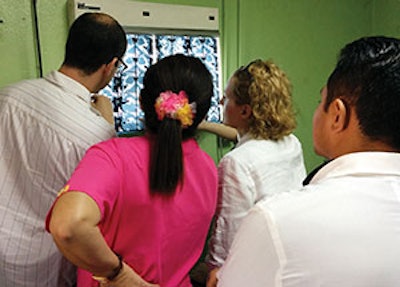 Ted McRackan and Ilka Naumann look over a pre-operative patient’s CT with the residents.