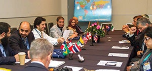 A lively discussion during the Middle East Caucus at the AAO-HNSF Annual Meeting & OTO EXPOSM.
