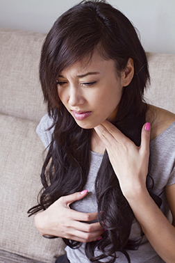 sick woman with sore throat, inflammation