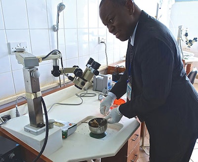 Samuel Adoga, MD, otolaryngologist at Jos University Teaching Hospital, Jos, Nigeria, in the new temporal bone laboratory. The lab is dedicated to the late Academy Member Jack Van Doren Hough, MD.