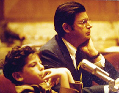 Robert J. Ruben, MD, testifies before the U.S. Senate in 1973, accompanied by his son.