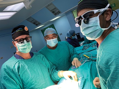 Christopher Hartnick, MD, of MEEI; Jose Bonilla, MD, of Bloom Hospital, El Salvador; and Asitha Jayawardena, MD, of MEEI conducting laryngotracheal reconstruction.