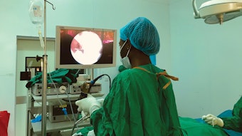 Muhimbili University of Health and Allied Sciences senior resident in the operating room performing a functional endoscopic sinus surgery.