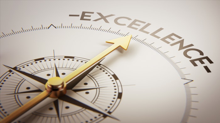 Compass pointing toward excellence