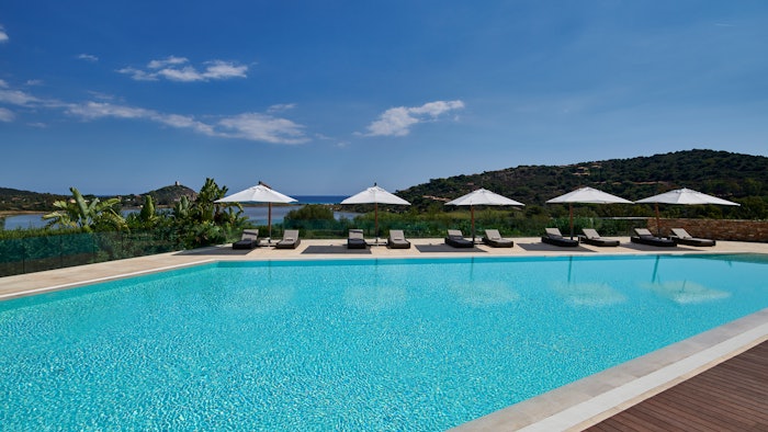 The Bioaquam poolside bar within the Conrad Chia Laguna Sardinia resort offers cuisine designed with wellbeing in mind, drawing on the energy of its setting amid lush nature and relaxing aromas.