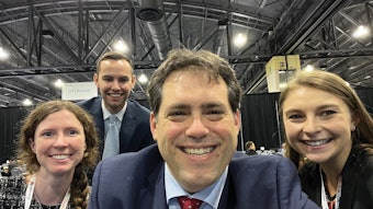 Daniel C. Chelius, Jr. (center), with three medical student colleagues at the Annual Meeting in Philadelphia.