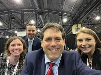 Daniel C. Chelius, Jr. (center), with three medical student colleagues at the Annual Meeting in Philadelphia.