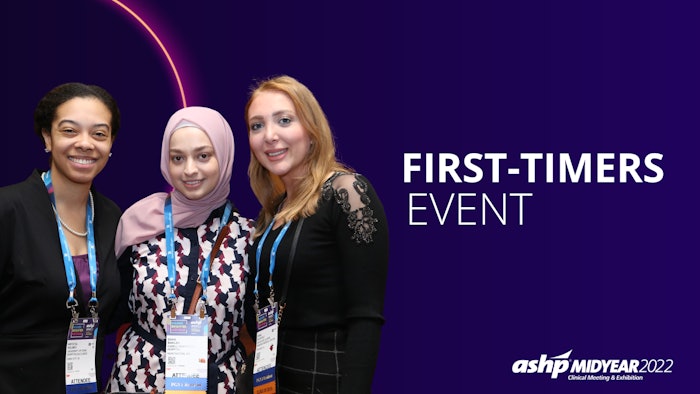 Three women posing with convention badges