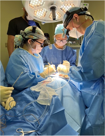 Dr. Sara Yang, Dr. Steven Charous, and medical student Shaley Albaugh performing a thyroidectomy