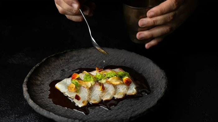 Designed in partnership with AvroKO, AMA Sushi’s striking interiors bring the storied history of the Ama divers to life, seamlessly blending a minimalist Japanese aesthetic with the resort’s signature coastal style.