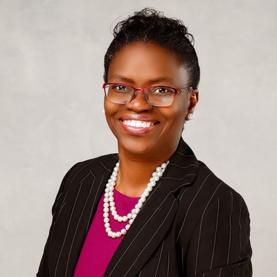 Head shot of Toyin Tofade, MS, PharmD, BCPS, CPCC, FFIP