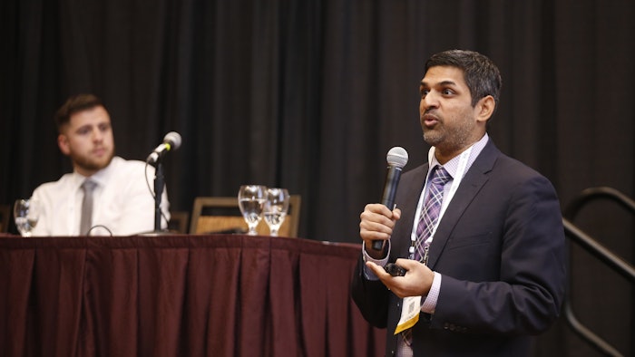 Christopher G. Medlin (seated), Sandeep Devabhakthuni