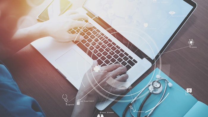Top view of smart medical doctor working with stethoscope and laptop and digital tablet computer on dark wooden desk with Vr diagram - stock photo