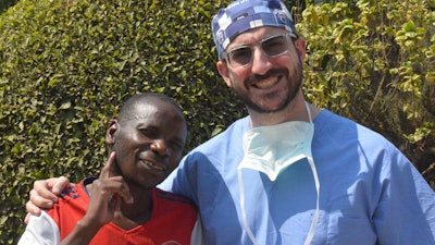 Dr. Bowers visits with his patient on postoperative day one following a superficial parotidectomy.