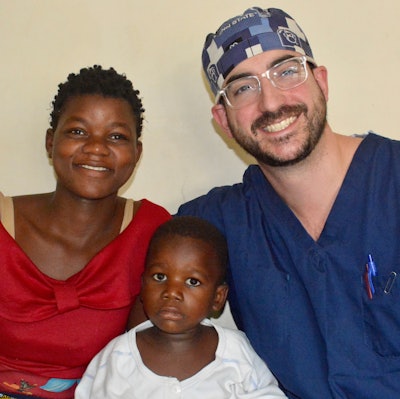 Dr. Bowers meets with a pediatric patient suffering from recurrent respiratory papillomatosis and his mother to discuss the procedure.
