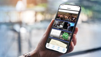 Phone in hand showing mobile app