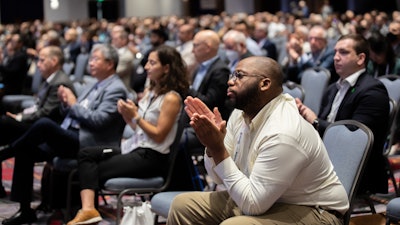 Attendees kick-start their day at the 2022 Annual Meeting Opening Ceremony.